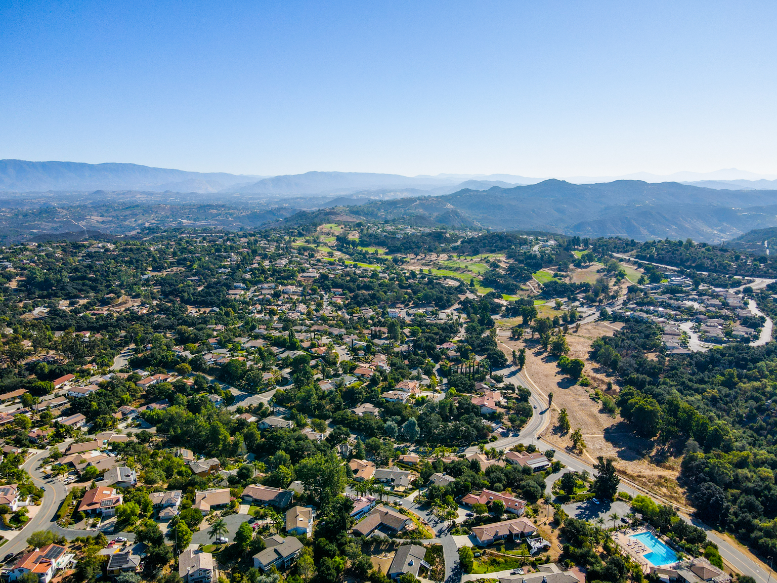 Technician installing attic insulation in Hidden Meadows